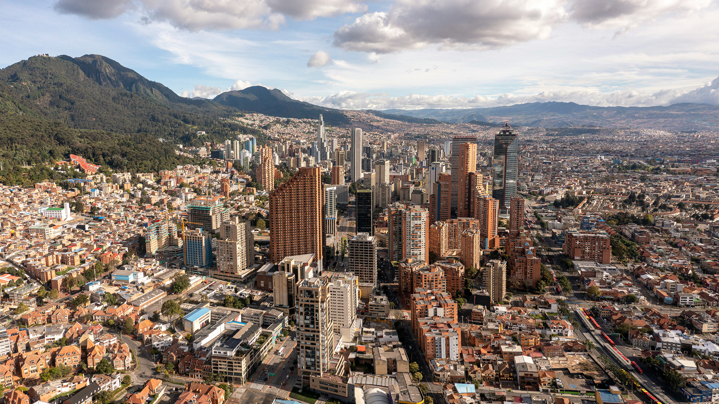 Aerial view of Bogotá with the Andean foothills behind