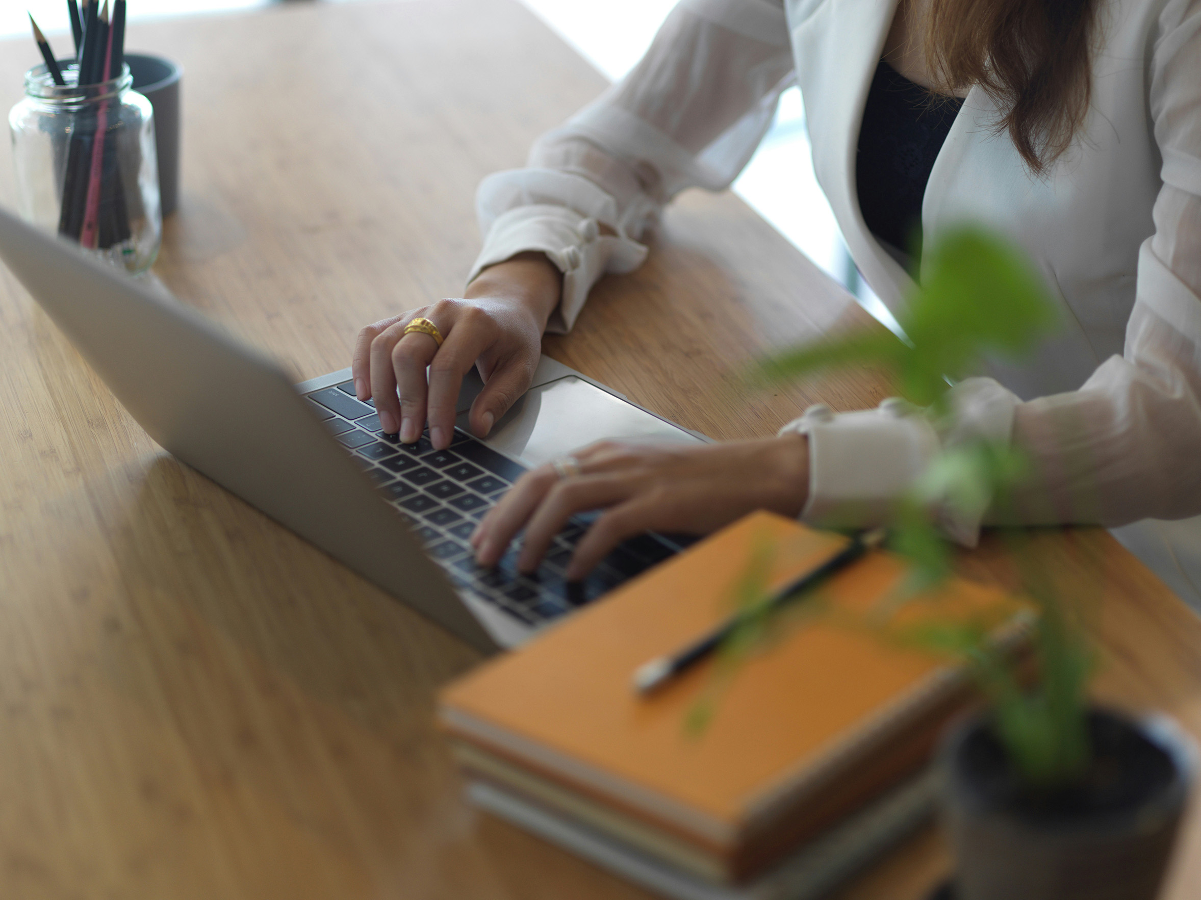 Architect drafting plans at a desk
