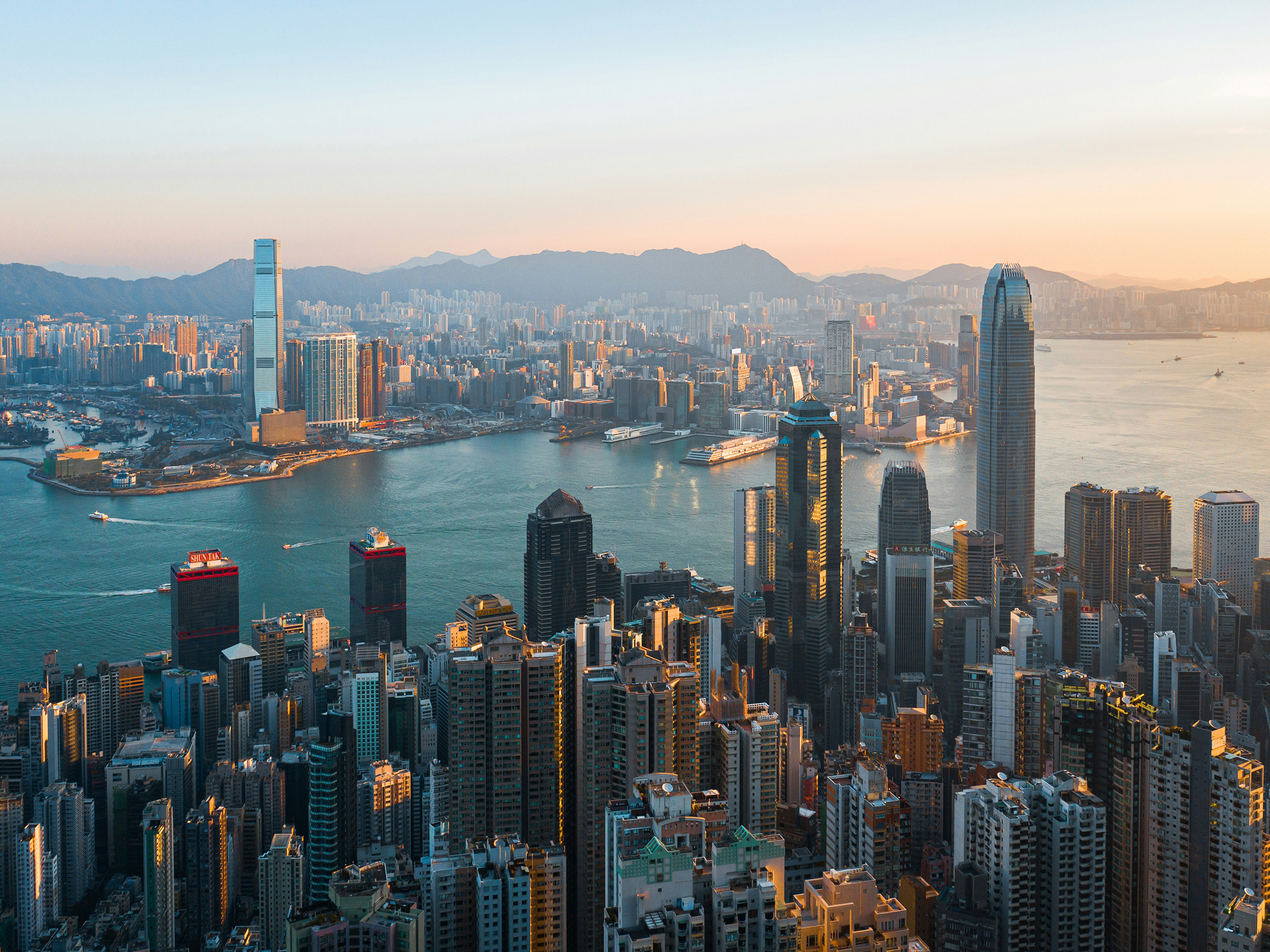 Hong Kong skyline and Victoria Harbour at sunset